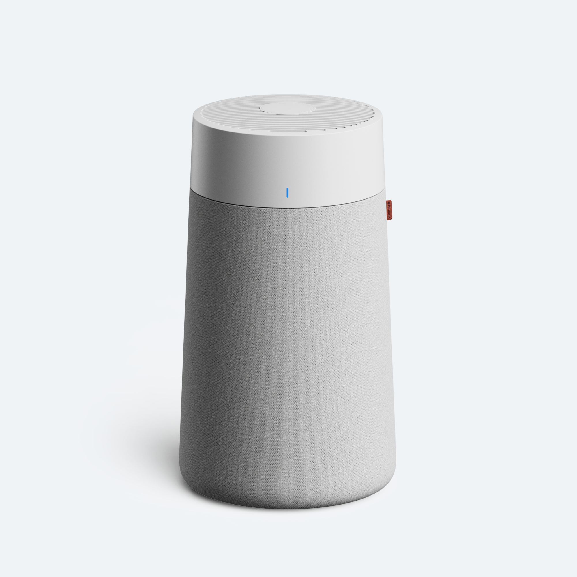 Pale cylindrical Blueair Blue Pure 411i+ Max with gray fabric pre-filter, top outlet and blue status light