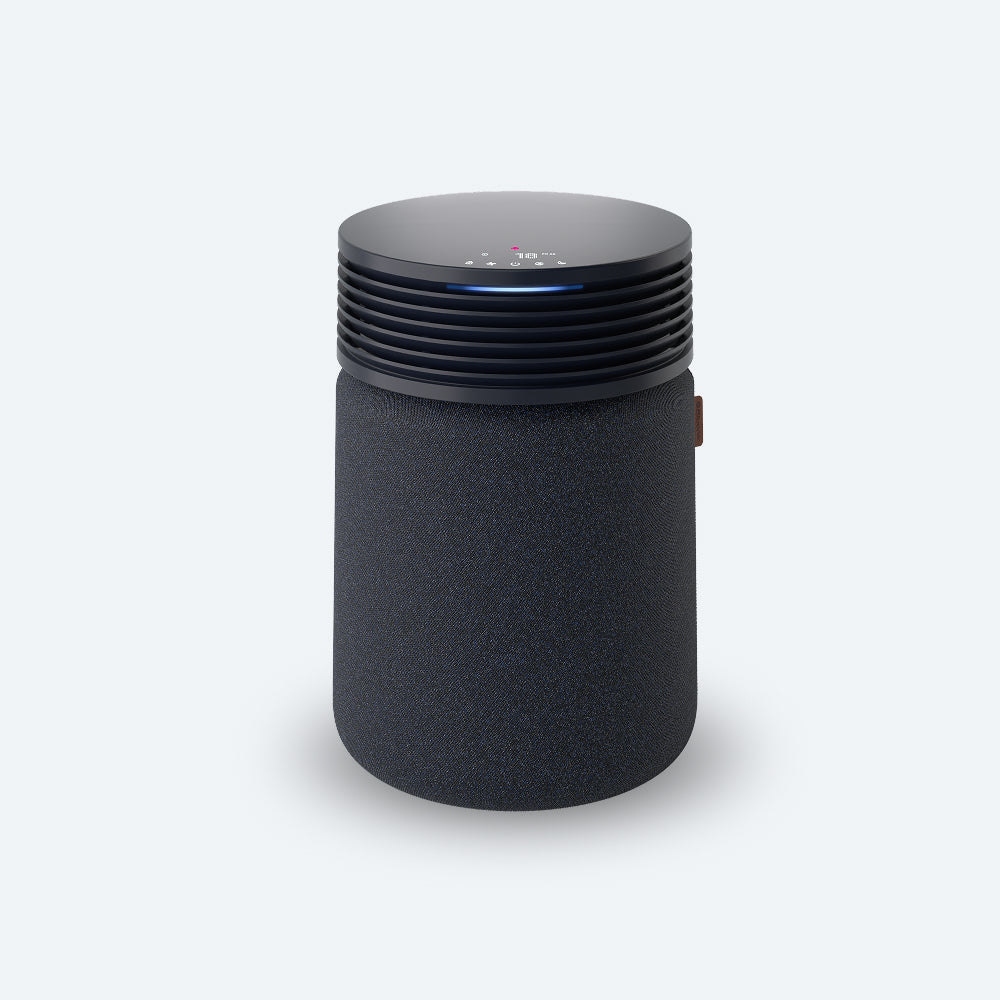 Dark Midnight Blueair Blue Signature Medium purifier with fabric-wrapped lower body and tabletop-style top