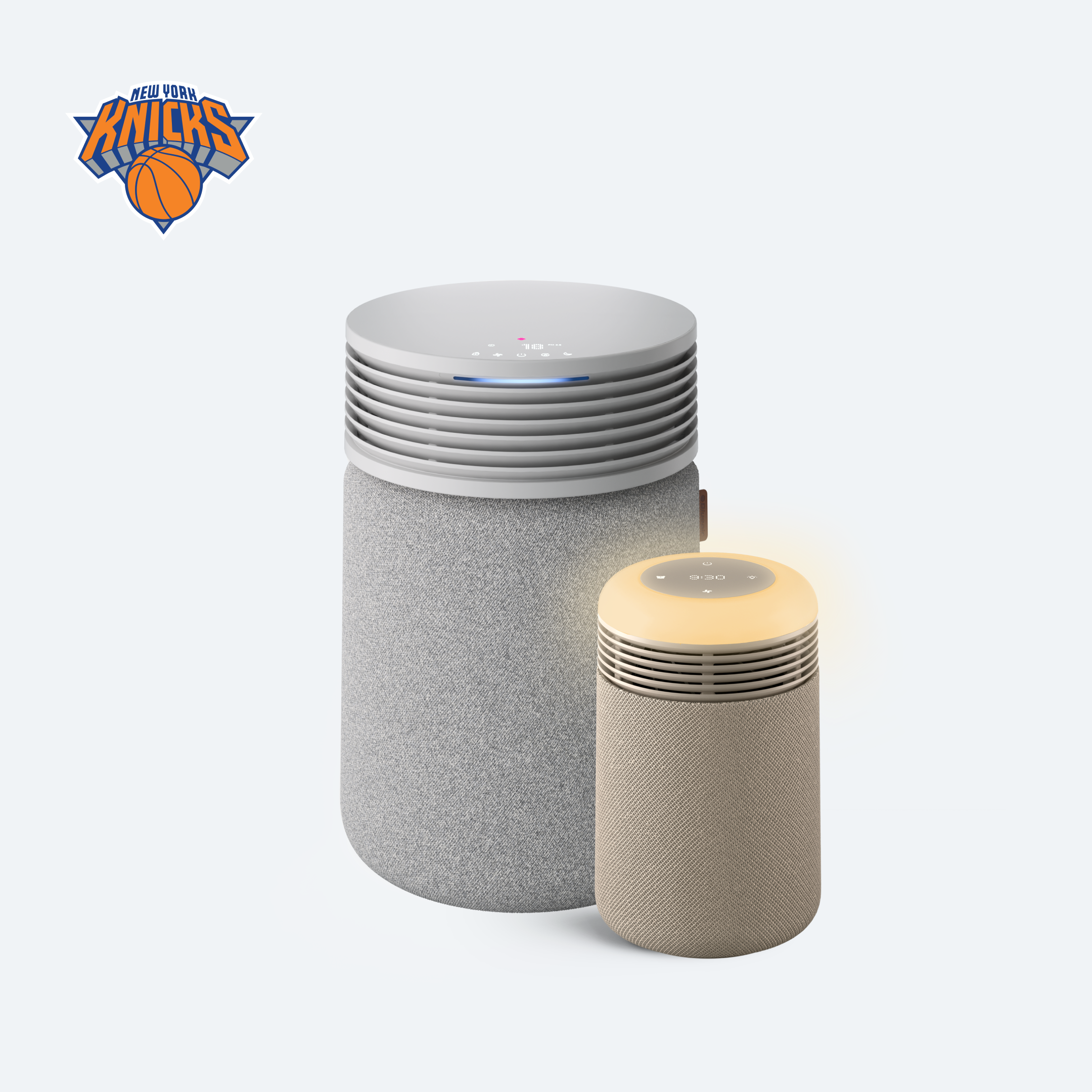 Blueair Sleep Athlete Bundle Medium promotional render showing a light Nordic Fog Blue Signature Medium purifier beside a light Mini Restful sunrise-clock purifier; a New York Knicks promotional badge appears in the image.
