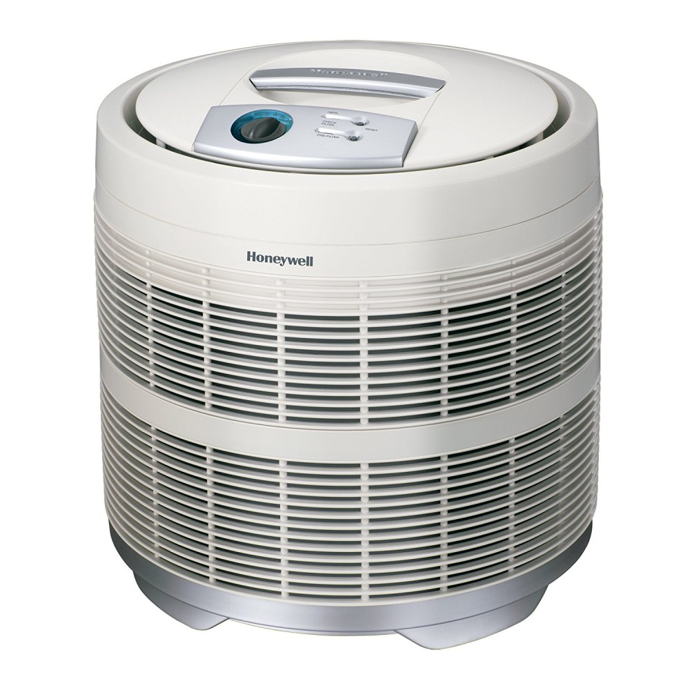 Purificador redondo blanco Honeywell 50250 con asa de transporte superior y perilla de control manual