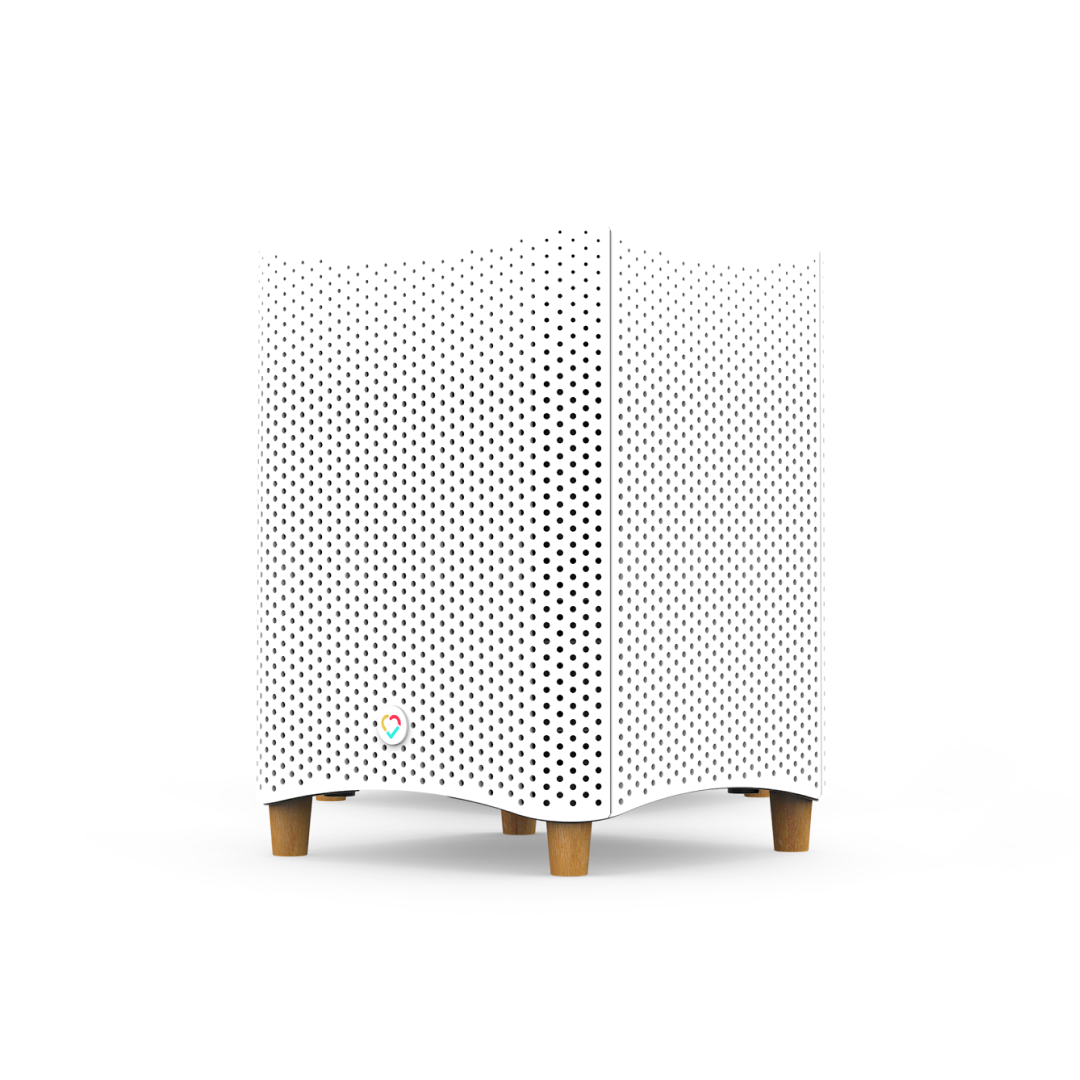 Original Mila Air purifier in a white perforated cabinet with wooden feet